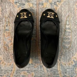 Black Tory Burch wedges with gold hardware accents in size 9